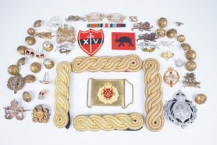 Sundry items of British and Indian army insignia including cap badges, dress epaulettes and a
