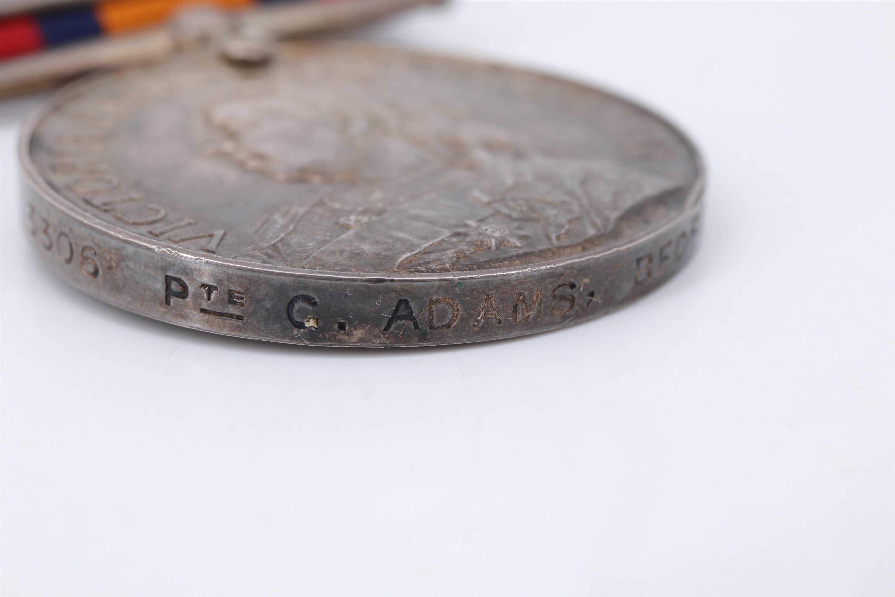 An India Medal with Relief of Chitral 1895 clasp, engraved to 3306 Pte G Adams 1st Bn Bedford - Image 3 of 9