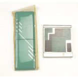 An Art Deco combination powder compact and cigarette case, together with a similar squeeze activated