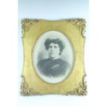 An Edwardian photographic portrait of a lady in an ornate gilt frame, under glass, 36.5 x 29 sight