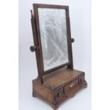 A mid 18th Century mahogany swivel toilet mirror, 32 cm x 20 cm x 54 cm