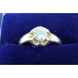 A diamond solitaire ring, having a brilliant cut round diamond of approximately 0.75 carat in a