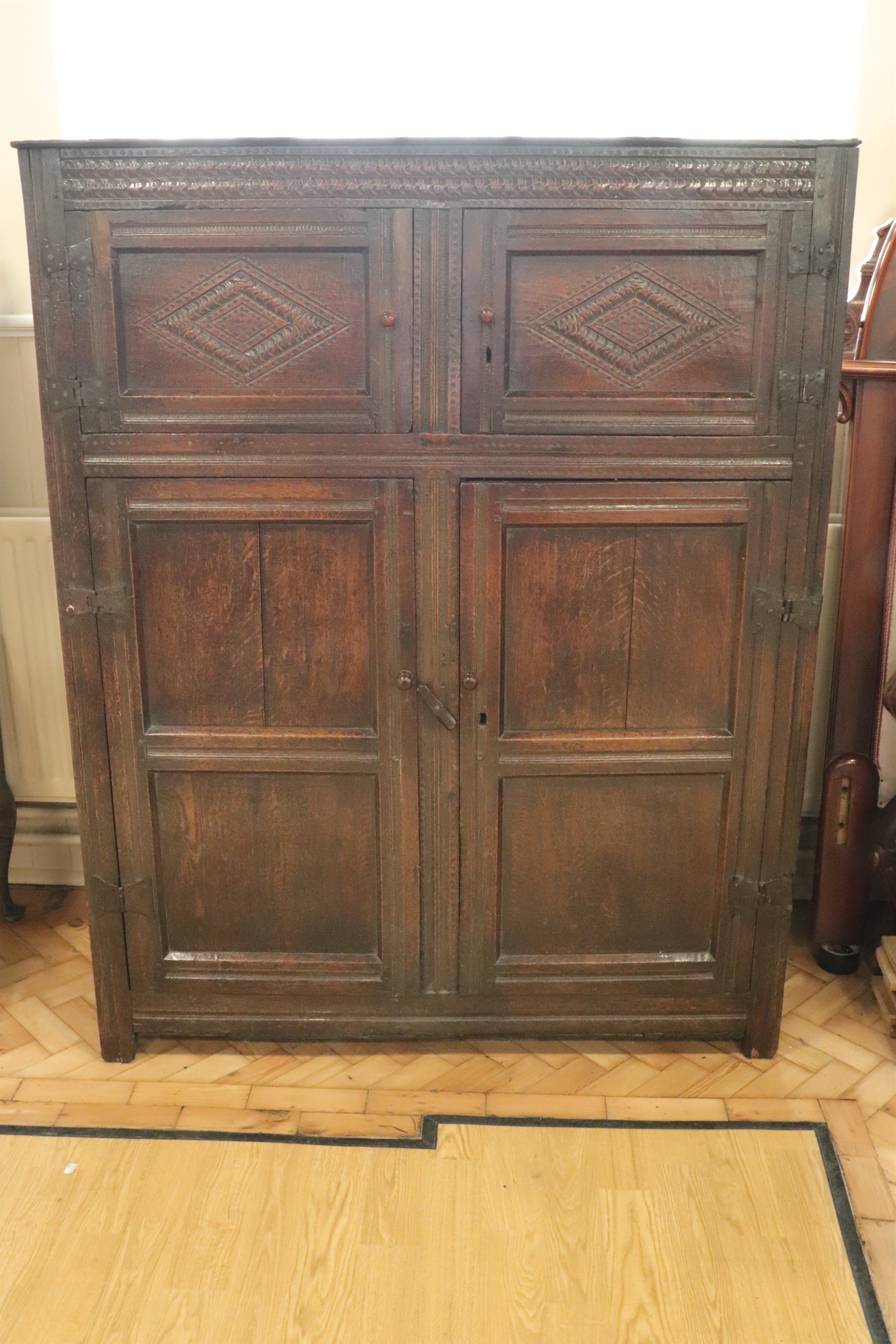 A late 17th / early 18th Century joined oak cupboard, 136 cm x 48 cm x 171 cm