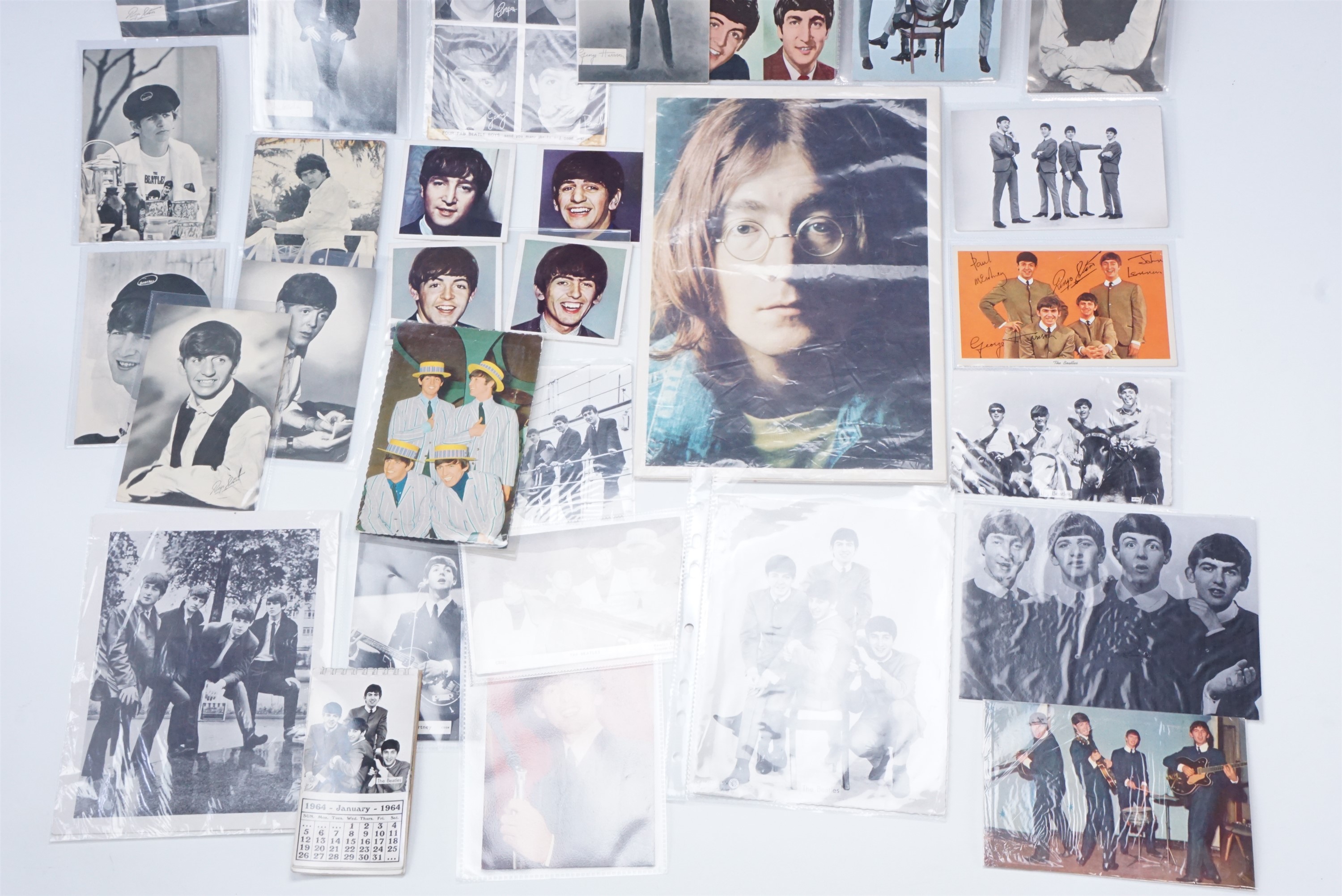 A group of The Beatles promotional photographs, postcards, a band calendar etc, circa 1960s - Image 3 of 3