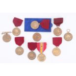 Seven US navy Good Conduct medals together with two Marine Corps examples