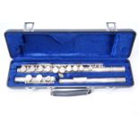 A cased Arbiter Pro Sound silver electroplate flute, body marked 800057, 67.5 cm