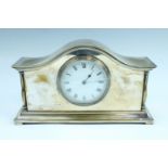 An Edwardian serpentine top electroplate mantle clock, having a French keyless wind and set drum