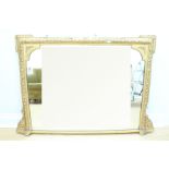 A Victorian gilt overmantel mirror, having egg and acanthus moulding, inverted broken top and sides,