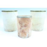 Three alabaster beakers, tallest 9.5 cm