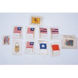 A small group of vintage cigarette silks depicting flags