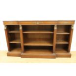 A contemporary brass-mounted mahogany break-front low bookcase, 138 cm x 30 cm x 79 cm