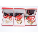 Three Georg Jensen Christmas ornaments, gold electroplated brass for the years 1998, 1999, and 2000,