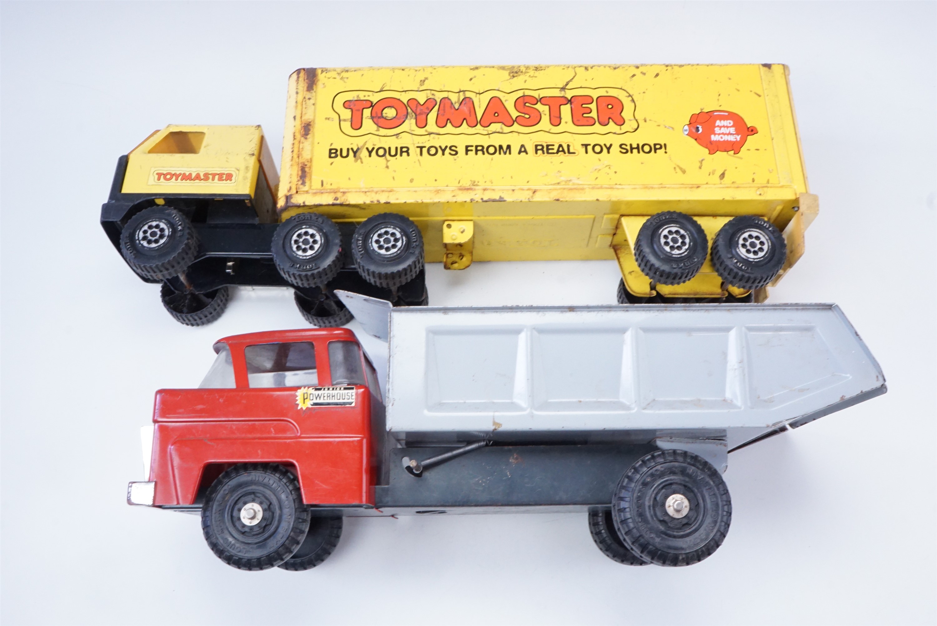A Marx tinplate hydraulic dump truck together with a Tonka Toymaster wagon