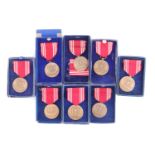 Four US Army Good Conduct Medals, boxed, and five others