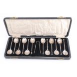 A cased set of 12 silver seal topped coffee spoons with sugar tongs, William Suckling Ltd,