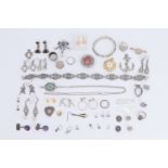 A group of vintage white metal and other costume jewellery, together with a religious relic and