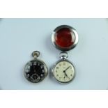 A Silvernus 15 jewel military style pocket watch, together with a Smith Empire pocket watch in a "23