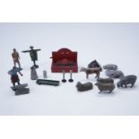 A group of early 20th Century cast lead and similar toys, including farm animals etc
