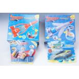 A group of boxed Thunderbirds toys, comprising two electronic play sets "Thunderbird 1" and "
