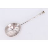 A James I Century silver seal top spoon, its terminal bearing engraved initial 'ATG', marks partly