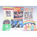 A group of The Beatles publications, including 23 issues of "The Beatles Monthly Book" 1964-1967,