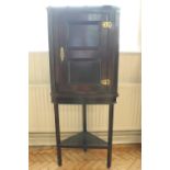 An 18th Century joined oak corner cabinet, on stand, 74 cm x 183 cm high