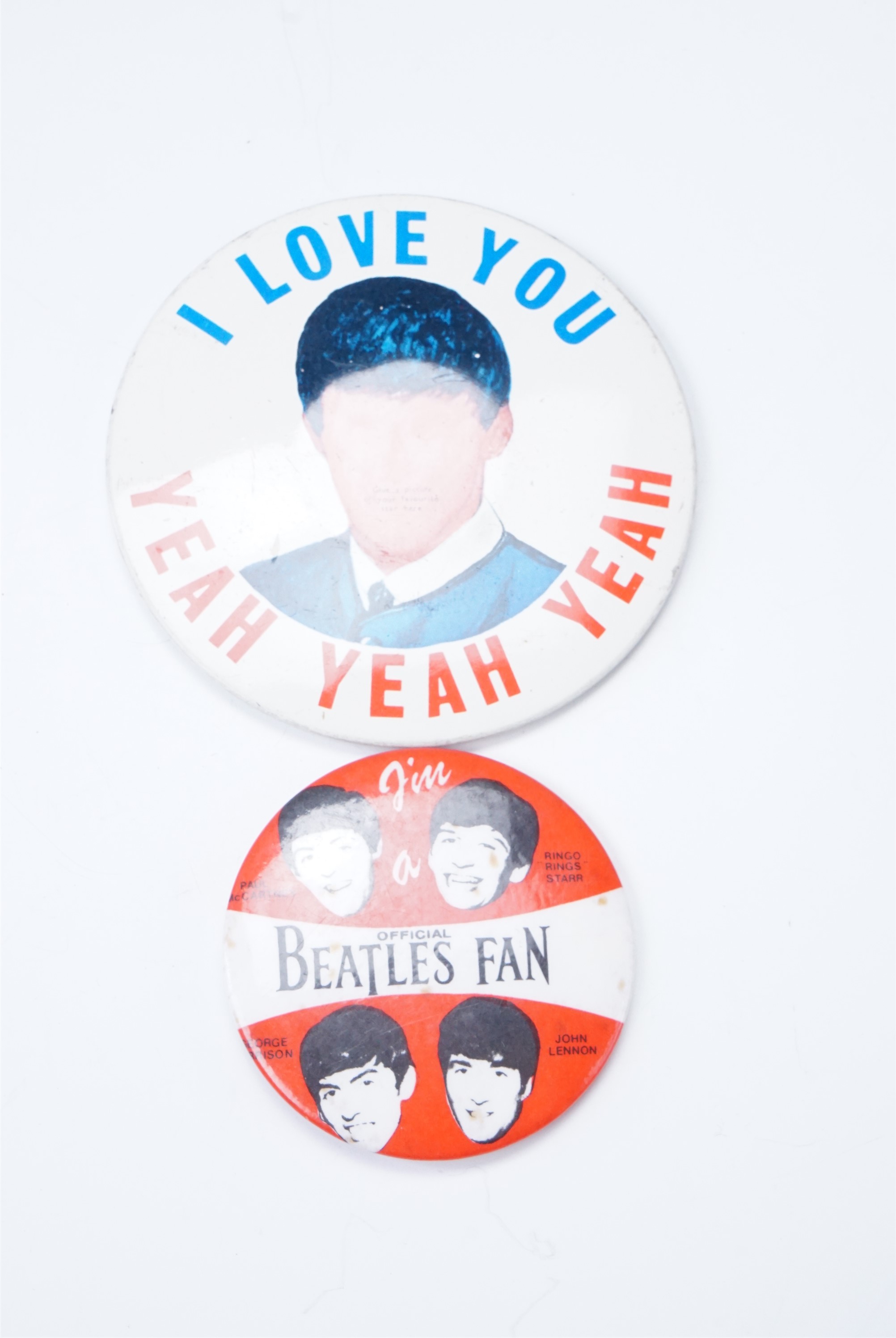 Two 1960s The Beatles pin badges