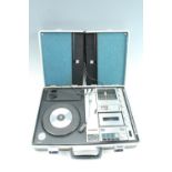 A 1970s Sanyo portable 'Solid State Music Centre' G-2615N-2, being a turntable, radio and cassette
