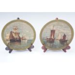 Two Victorian Scottish terracotta plaques, hand painted in oils with maritime scenes, impressed