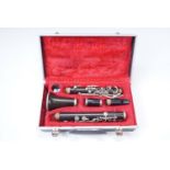 A cased French Console five piece clarinet