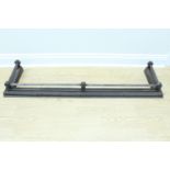 A Victorian cast iron fire curb, having a repeating pyramid moulding and a square rail raised on