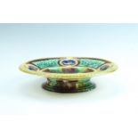 A Victorian majolica oval centre piece bowl, having a border of renaissance influenced strapwork