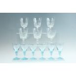 A set of six 1960s blue glass cordial glasses, having twisted gadrooned stems, and a set of six