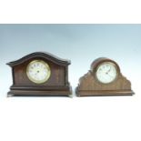 An Edwardian mahogany mantle clock, having a keyless wind and set French drum movement, with