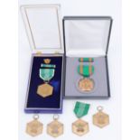 A US Army Commendation Medal together with a Navy and Marine Corps Achievement Medal, cased, and