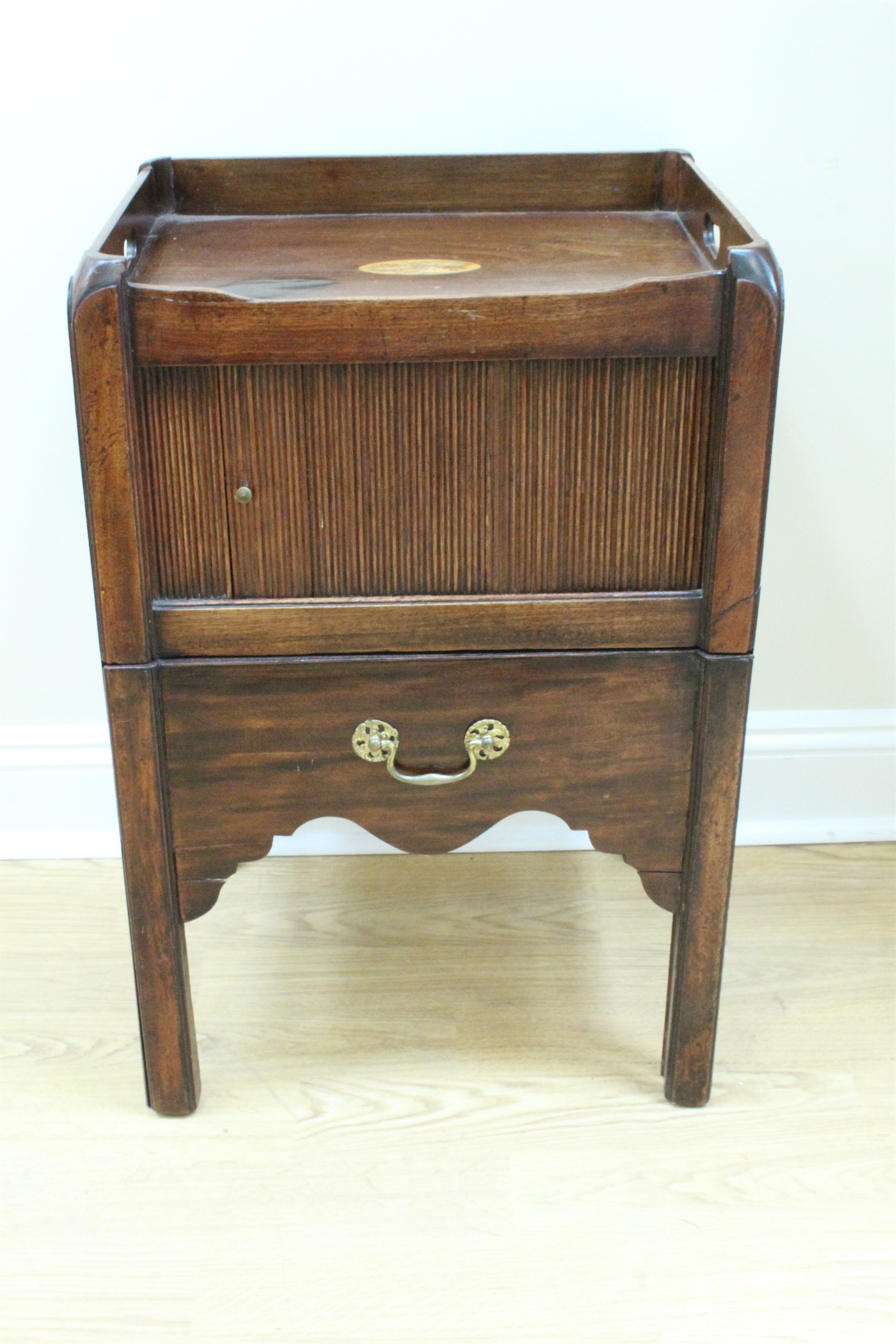 A George III marquetry-inlaid mahogany night stand