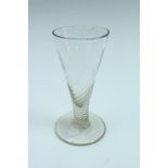 A late 18th / early 19th Century wrythen ale glass, in soda glass, 13 cm