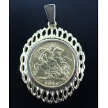 An 1894 gold half sovereign in a yellow metal pendant frame, 7.02 g, 42 x 27 mm including bail