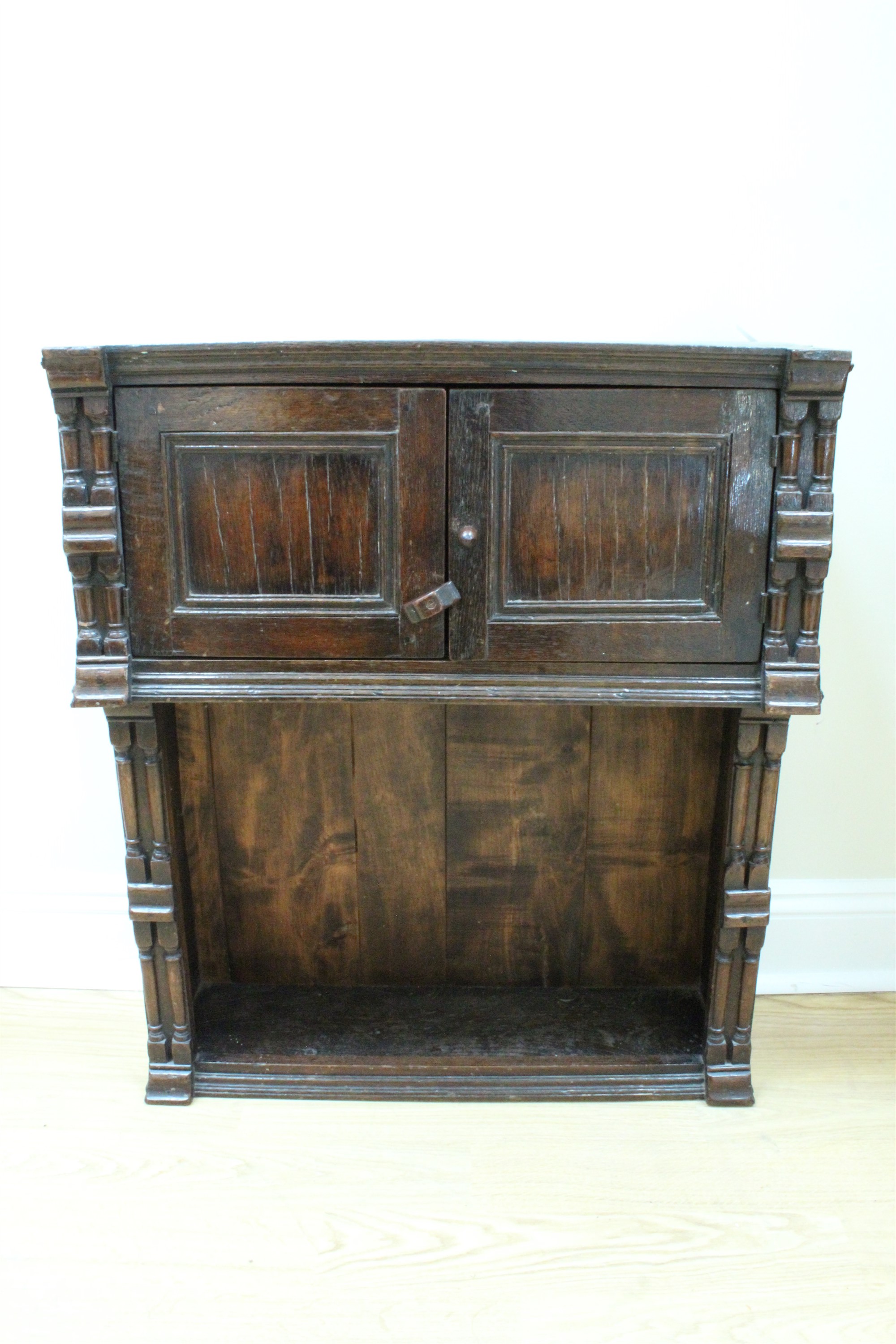 A small oak cabinet, incorporating early elements
