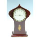 A Belle Epoque mahogany mantle clock, having a drum movement with platform escapement, the case of