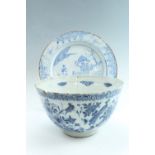 A late 17th / early 18th Century English Delft punch bowl, together with a charger, (a/f)