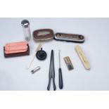 An advertising clothes brush, 'Atlas Preservative Co. Ltd. London', ebonised glove stretchers and