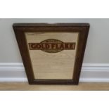 A Wills' Gold Flake advertising mirror in oak frame, 31 cm x 41 cm