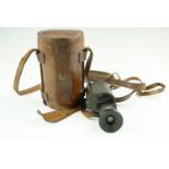 A 1908 Indian army monocular and hide case