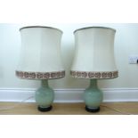 A pair of Chinese celadon lamps, (one a/f) 73 cm