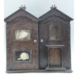 An early 20th Century scratch built electrically wired dolls house, 60 x 35 x 59 cm