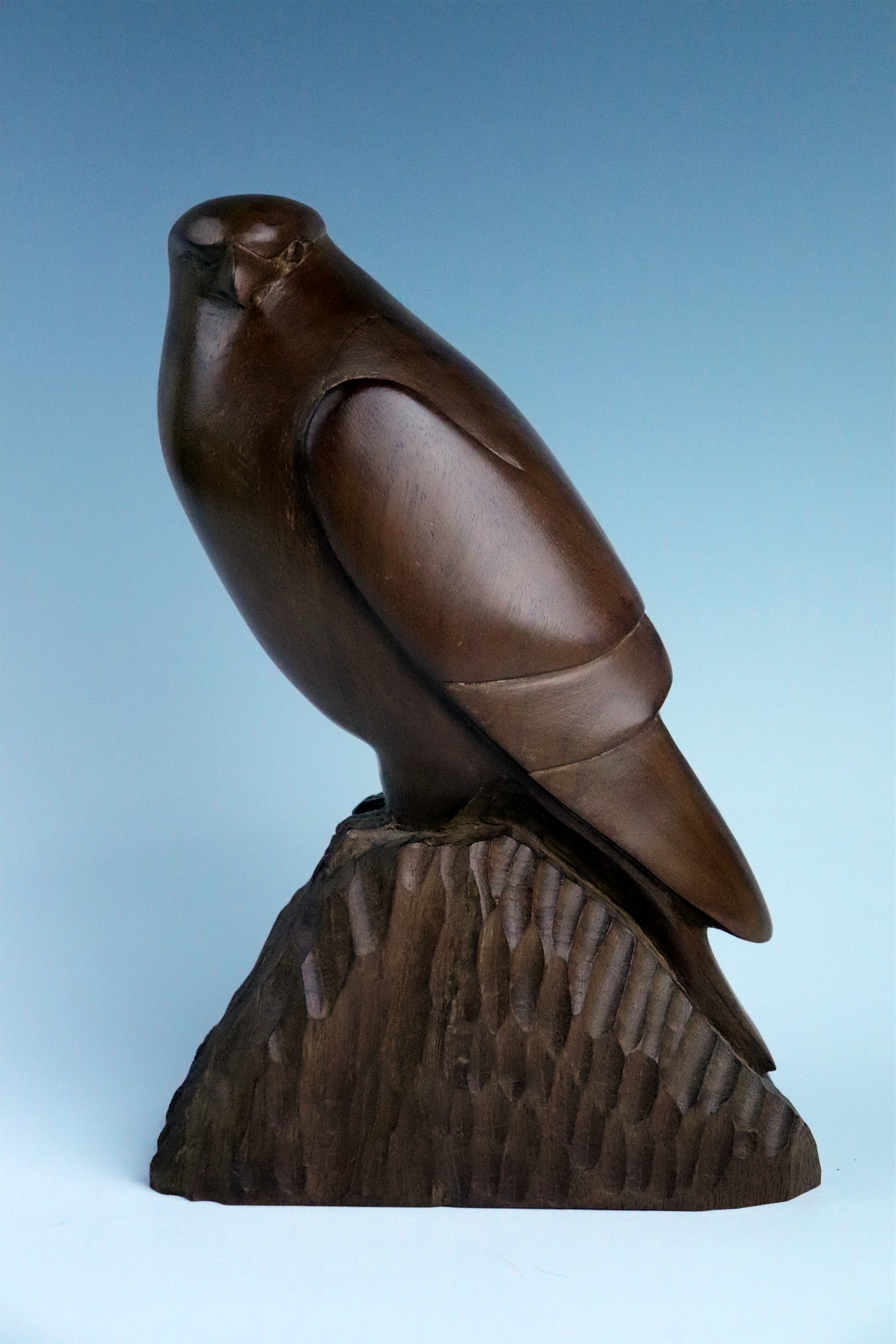 Ron Dickens (Cumbria, contemporary) "Kestrel", carved mahogany, inscribed and dated 1987, 28 cm ["