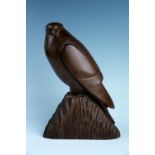 Ron Dickens (Cumbria, contemporary) "Kestrel", carved mahogany, inscribed and dated 1987, 28 cm ["