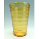 A Whitefriars style amber glass vase, having horizontal rings, 20 cm