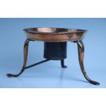 An early 19th Century copper and wrought iron kettle stand, 16 cm (a/f)